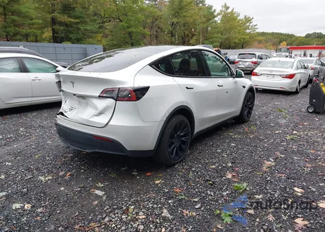 2023 Tesla Model Y Awd/Long Range Dual Motor All-Wheel Drive z USA, uszkodzony, nr VIN 7SAYGDEE6PA164777